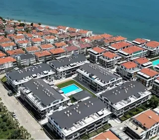 ALTINOLUk YAĞCILARDA DENİZE SIFIR ADRA SİTESİNDE 1+1 FULL EŞYALI SATILIK DAİRE - Görsel 1